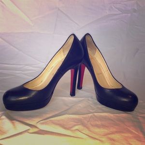 Christian Louboutin black leather pumps